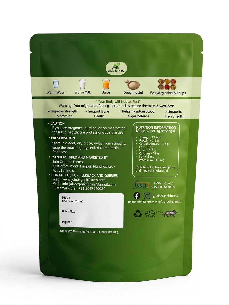 A green stand-up pouch of JSSO Organic Body & Wellness powder, showing the back panel with product information, usage suggestions, warnings, and a white barcode label area.